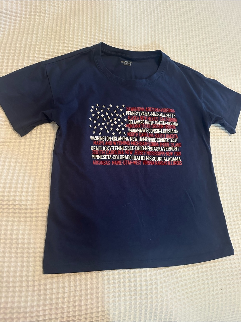 Maurices Navy Short Sleeve Tee with Red, White Star-Text Flag Graphic
